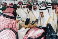 King Fahd laying the foundation stone for the extension of the Prophet's Mosque Click to view high resolution version